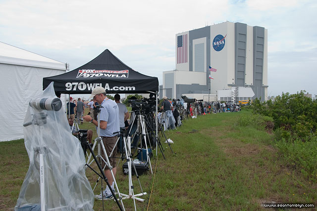 Wall of cameras and photographers, final launch of space shuttle Atlantis, STS-135