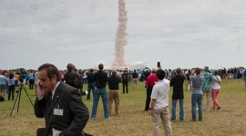 Gentleman on cell phone, final launch of space shuttle Atlantis, STS-135
